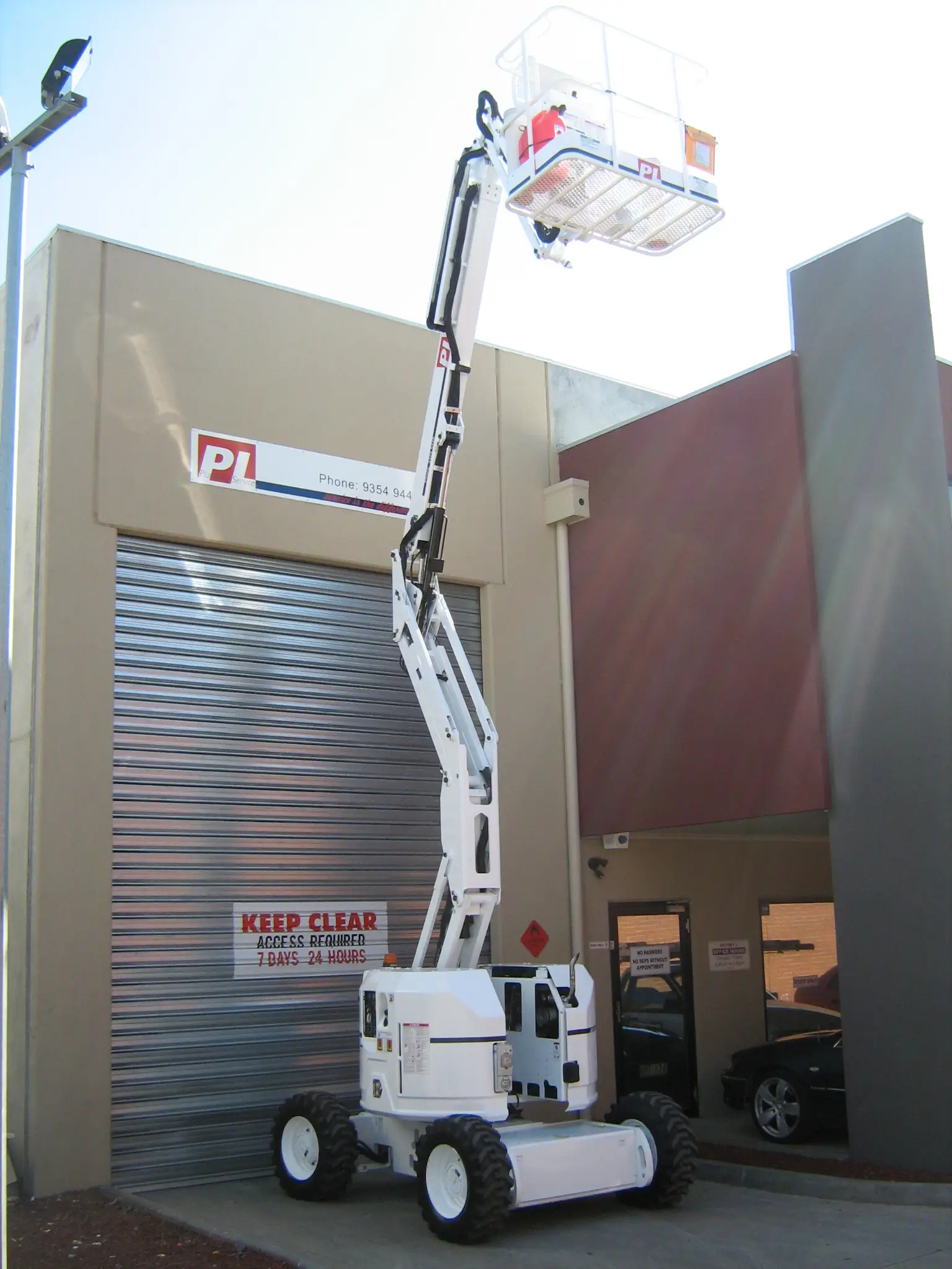 PL Plumbing Service Boom Lift image - raised