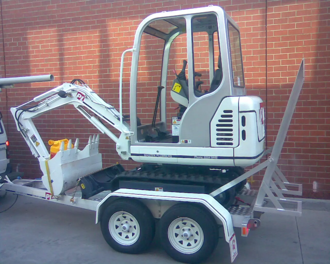 PL Plumbing Service Excavator image